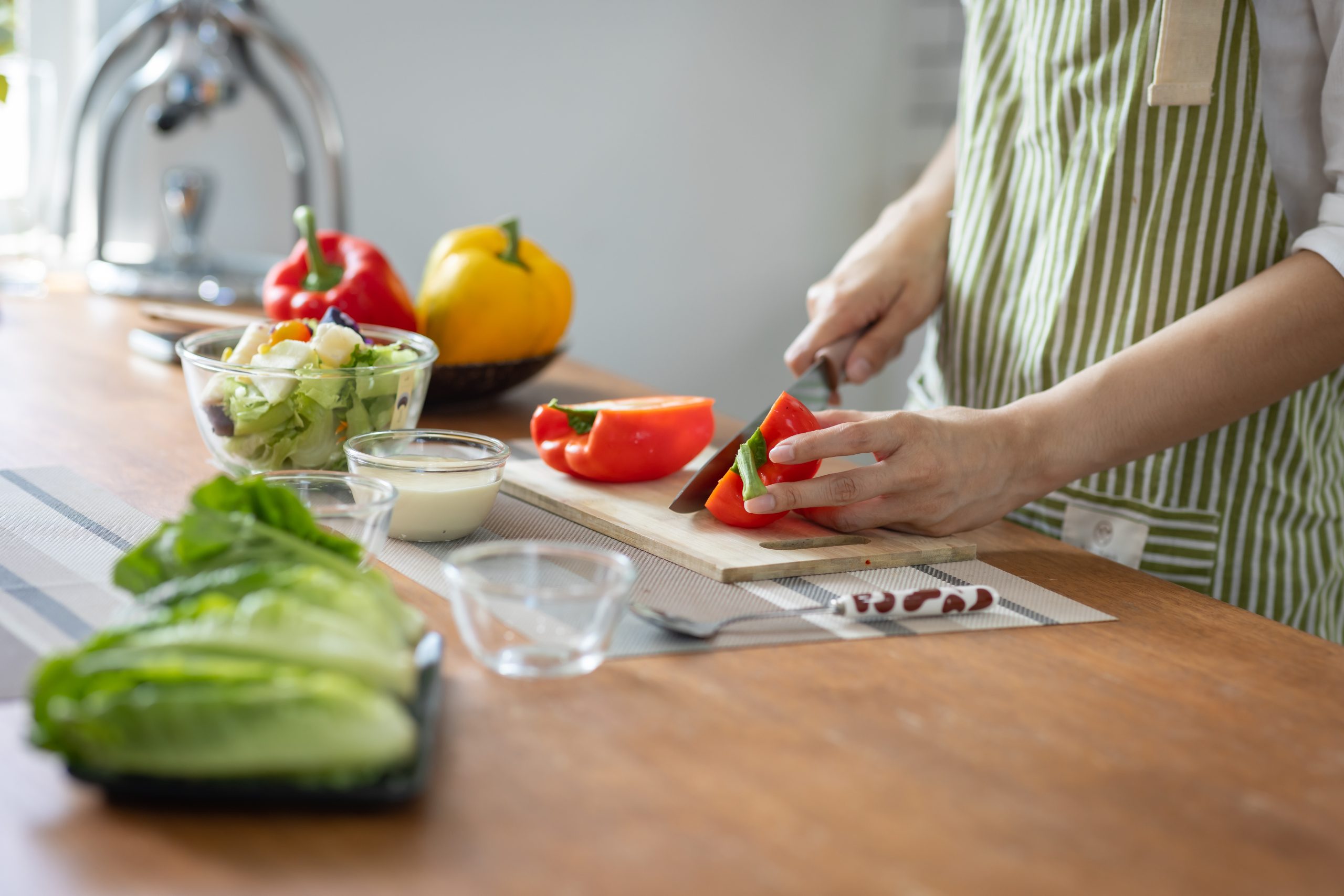 Portrait,Of,Attractive,Asian,Japanese,Woman,In,Kitchen,At,Home,